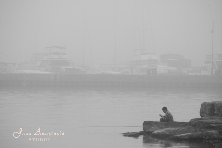 _JAS8480-WEB-Boy-texting-in-the-fog